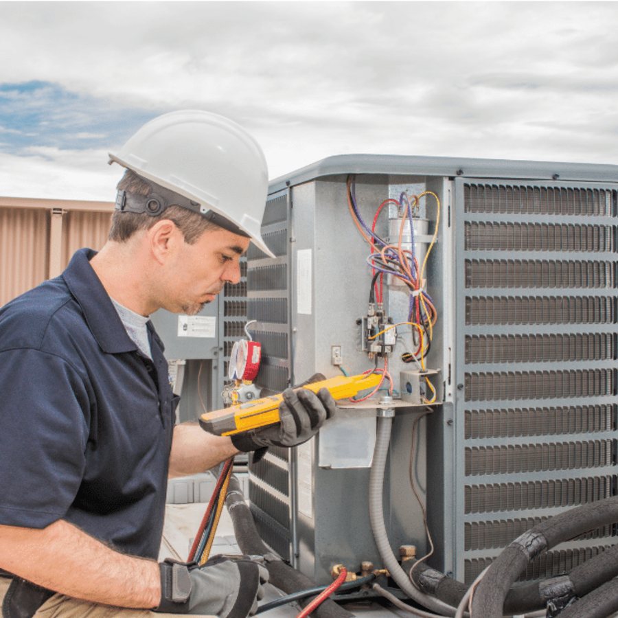 Burlington HVAC Pros HVAC technician servicing a system